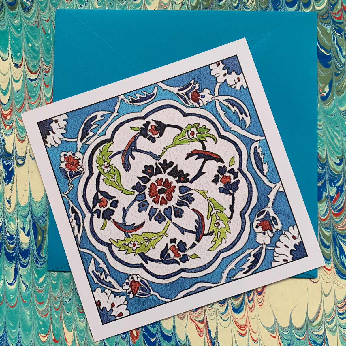 Decorative card with floral pattern on a marbled background