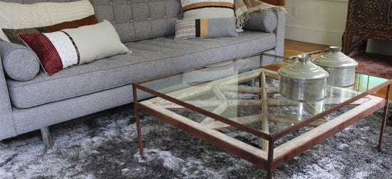table basse en fer forgé et incrustation bois