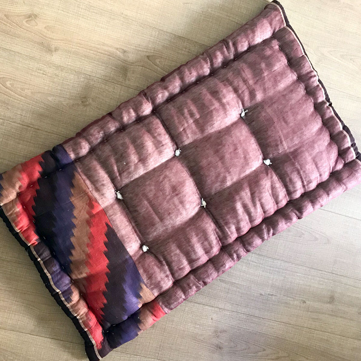 Quilted mattress black ikat.