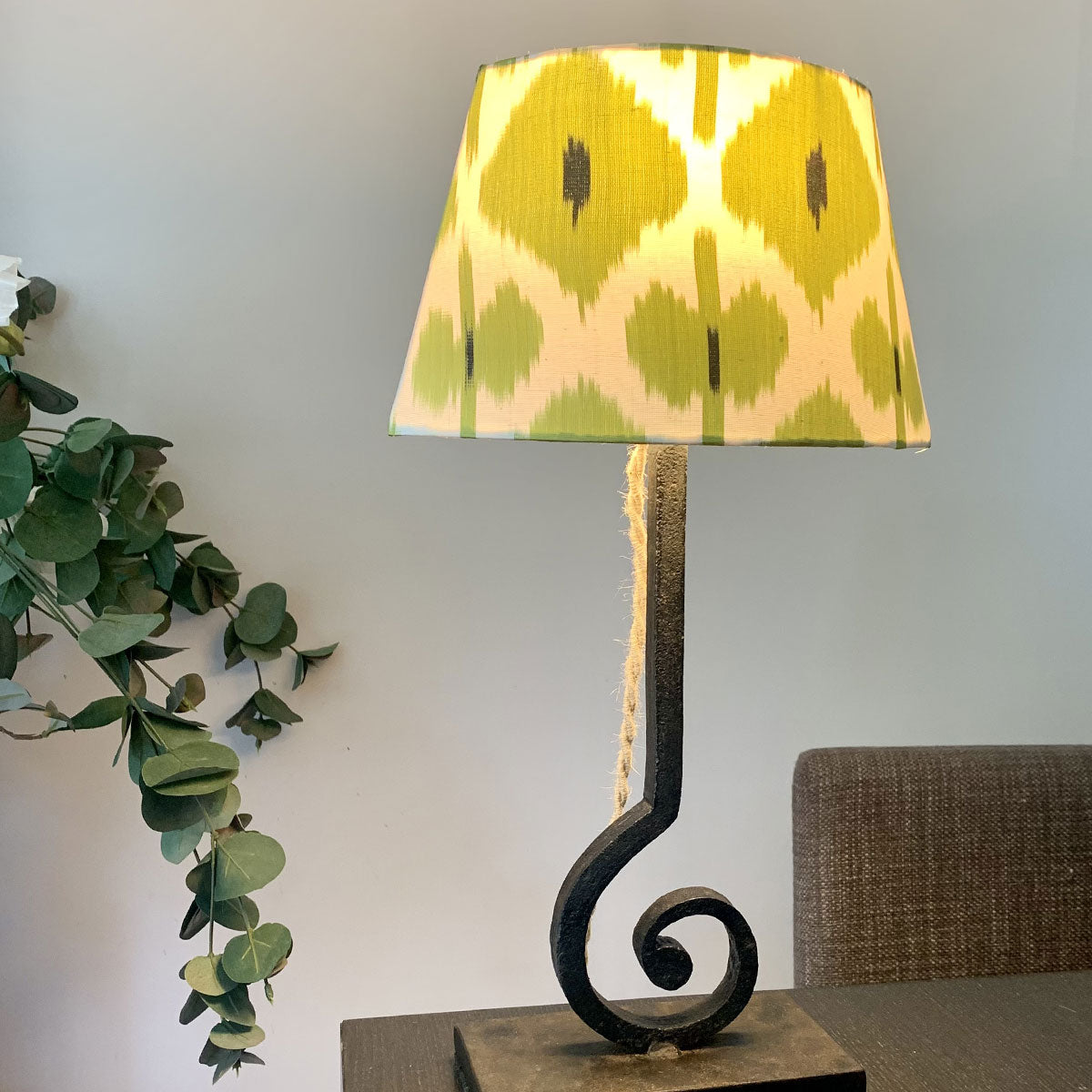 Mini curl iron side lamp with green Ikat lampshade