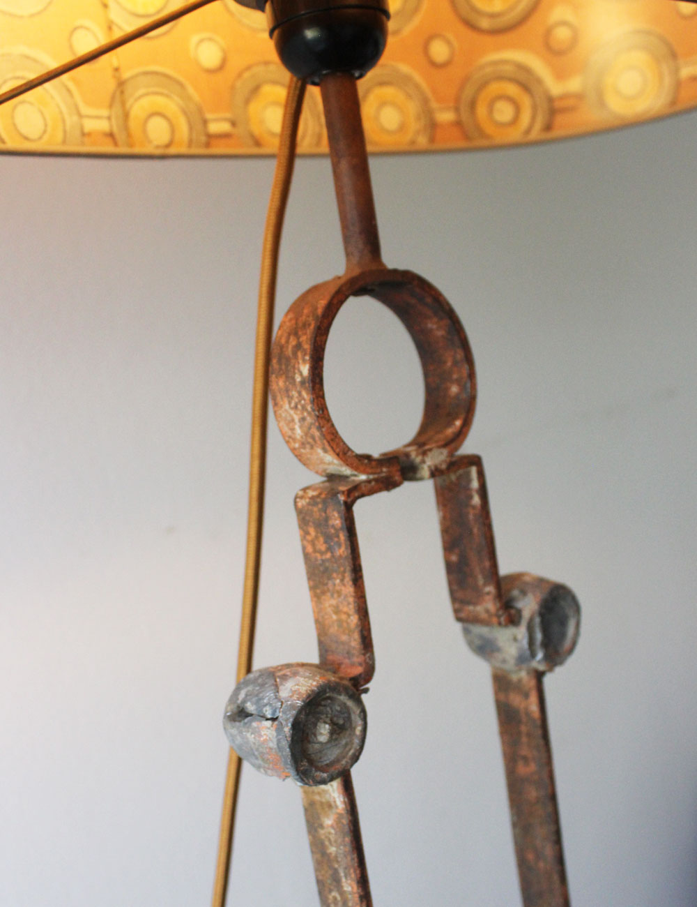 Salvaged Gate Transformation: Rustic Table Lamp with Iron Medallions and Silk Shade