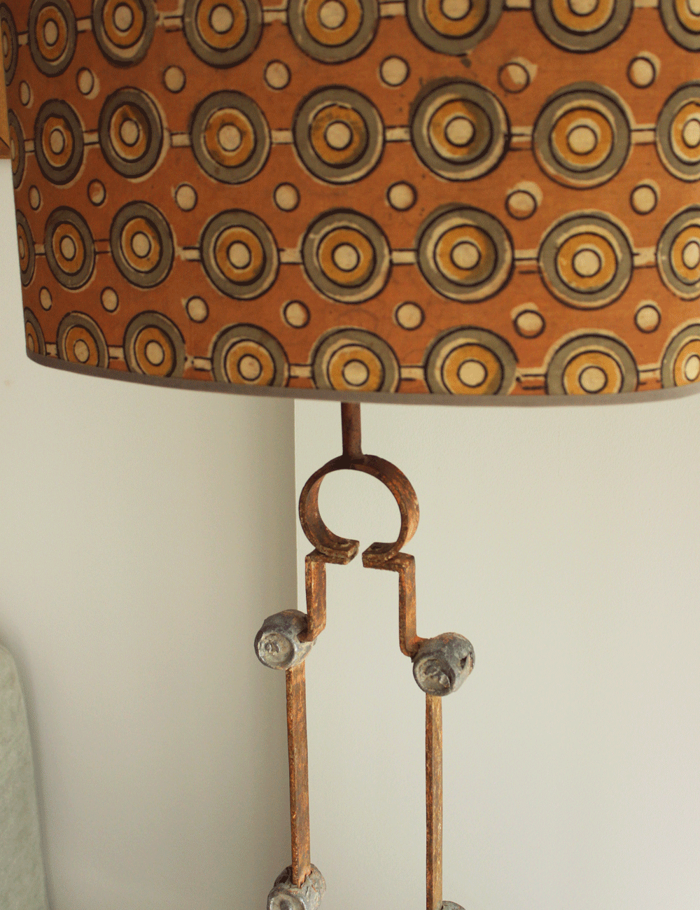 Salvaged Gate Transformation: Rustic Table Lamp with Iron Medallions and Silk Shade