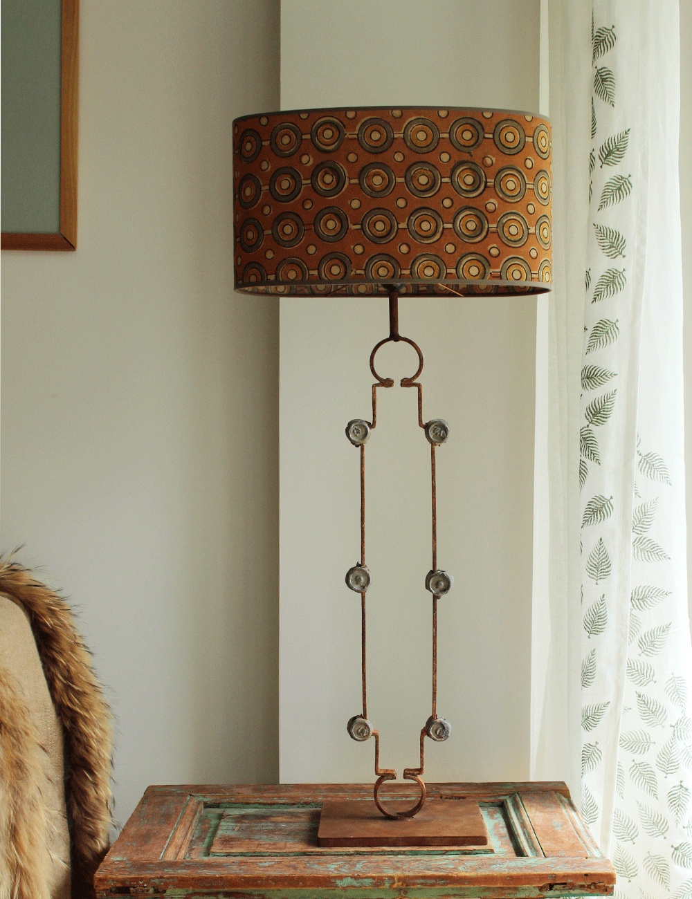 Salvaged Gate Transformation: Rustic Table Lamp with Iron Medallions and Silk Shade