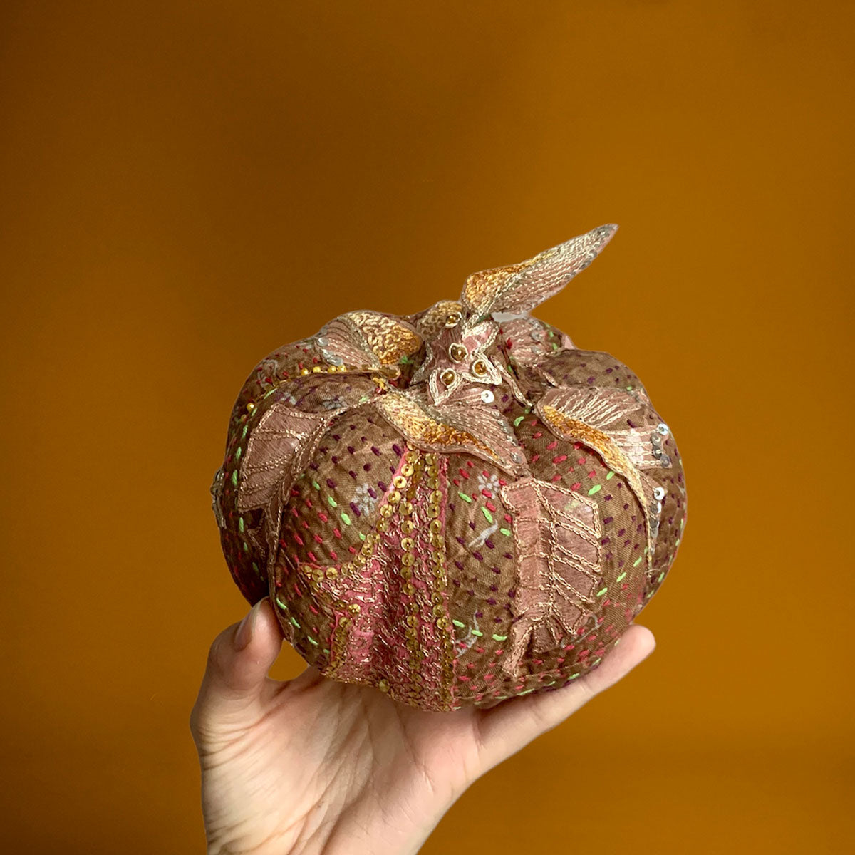 silk embroidered pumpkin with antique fabric