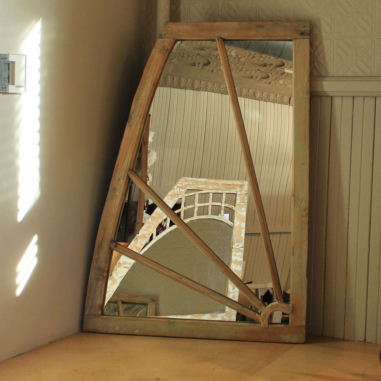Wood Cadran mirror.