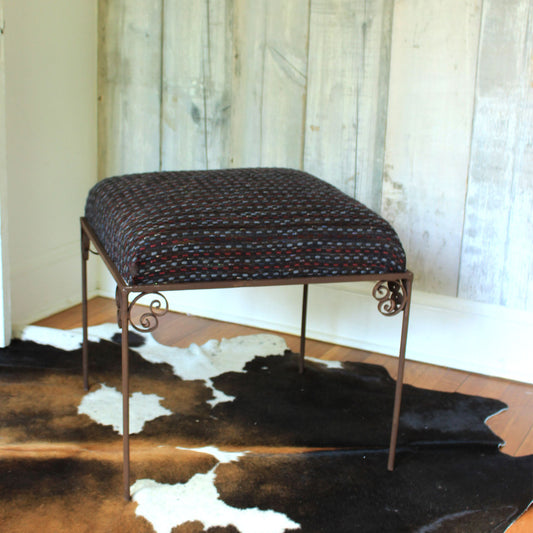 Repurposed wrought iron upholstered ottoman